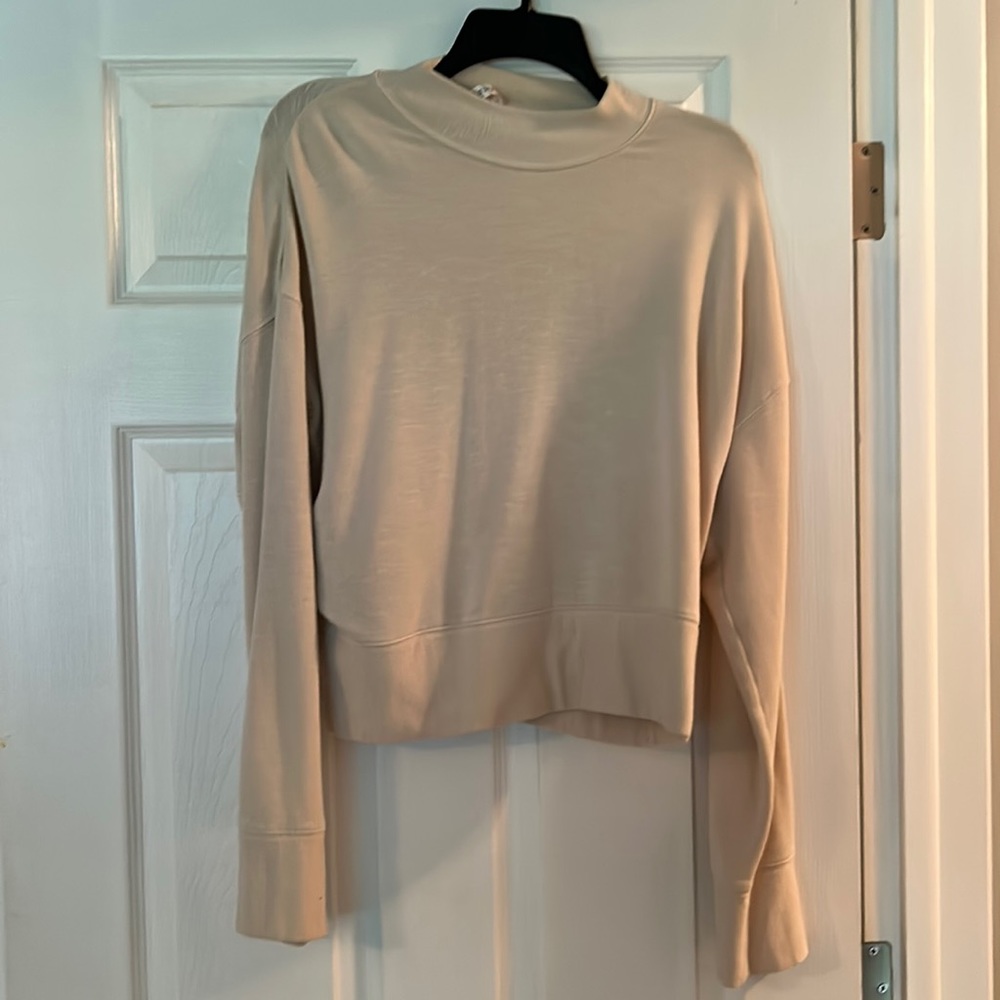Cream Turtle neck Fabletics sweater